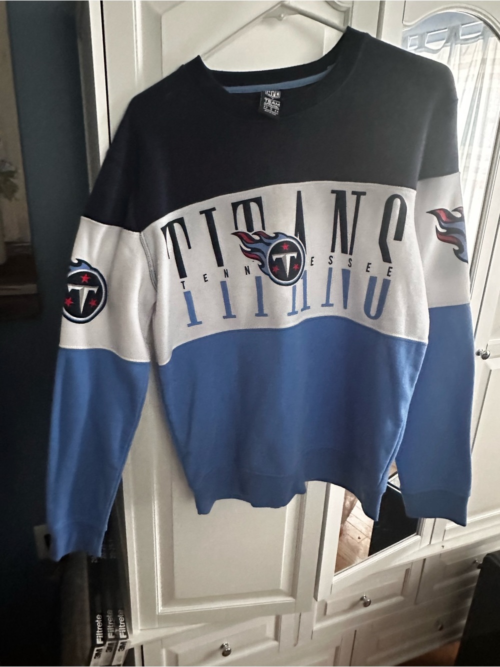 NFL Black Crewneck with Light Blue Neck Trim